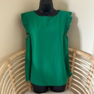 NWT cute kelly green blouse with flirty l, squared off ruffle shoulders